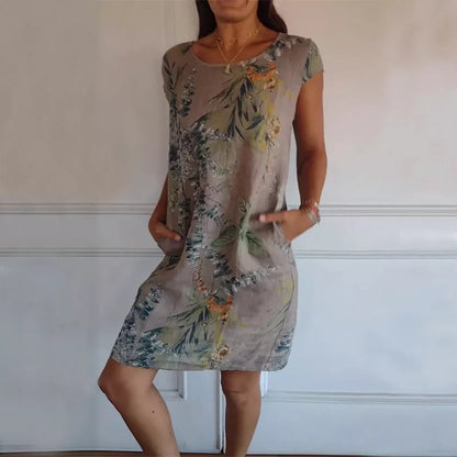 Women's floral print cotton dress with loose fit and short sleeves in various colors