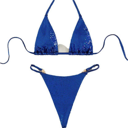 Solid blue women's T-back bikini set laid flat, showing bra and briefs.