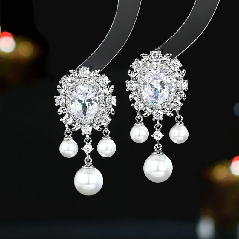 Oval geometric earrings with zircon inlay and pearl tassel in light purple colour option