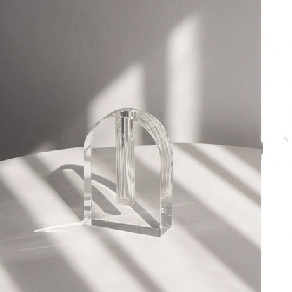 Transparent crystal vase with internal bubble formations measuring 18cm height and 12cm diameter