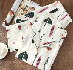 Traditional maternity pajama set with 100% cotton batik fabric, ankle-length trousers, and full-length bell sleeves