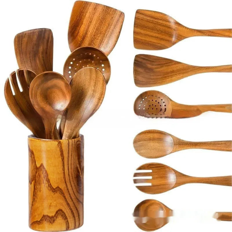 7-piece wooden kitchen utensil set with spoon, spatula, and soup spoon on a table