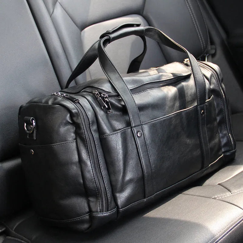 Black PU men's travel bag, 50cm wide and 26cm high, with phone, cigarette, and hidden zipper bags