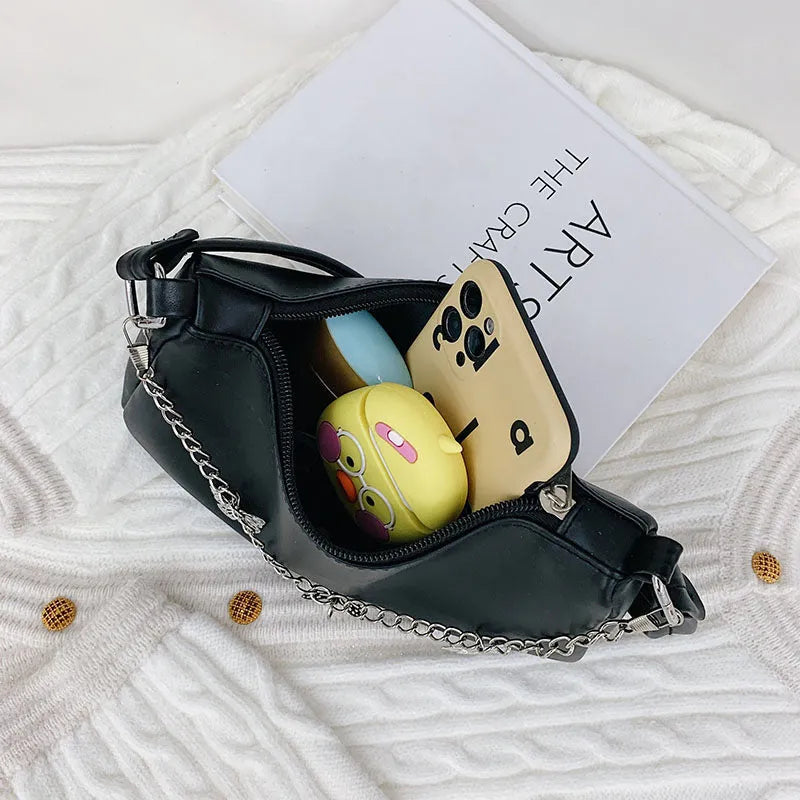 Women's black PU leather chain crossbody bag with butterfly clasp and structured square silhouette