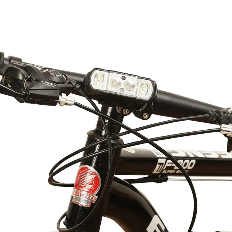 Black bicycle headlight with rechargeable battery showing 350 lumen XPG-LED lighting