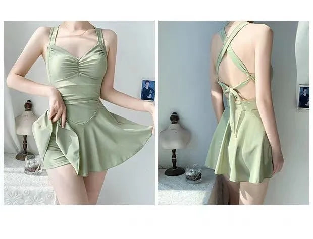 Solid colour one-piece swimsuit for women showing backless conservative design on a mannequin.