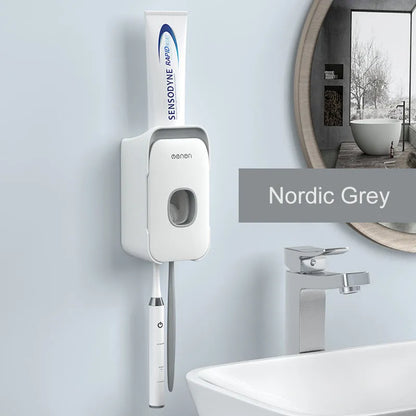 Automatic toothpaste dispenser with motion sensor and LED light in blue, grey or pink colours mounted on bathroom wall