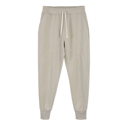 Men's casual trousers with drawstring ankle ties in polyester cotton fabric