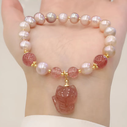 Women's light pink freshwater pearl bracelet with fox charm and zodiac animal design