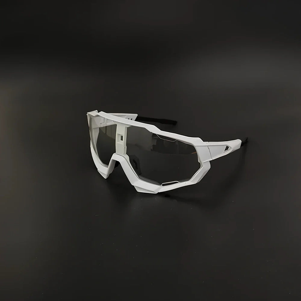 Cycling glasses with interchangeable lenses showing UV400 protection and lightweight frame design