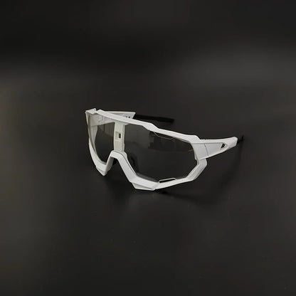 Cycling glasses with interchangeable lenses showing UV400 protection and lightweight frame design