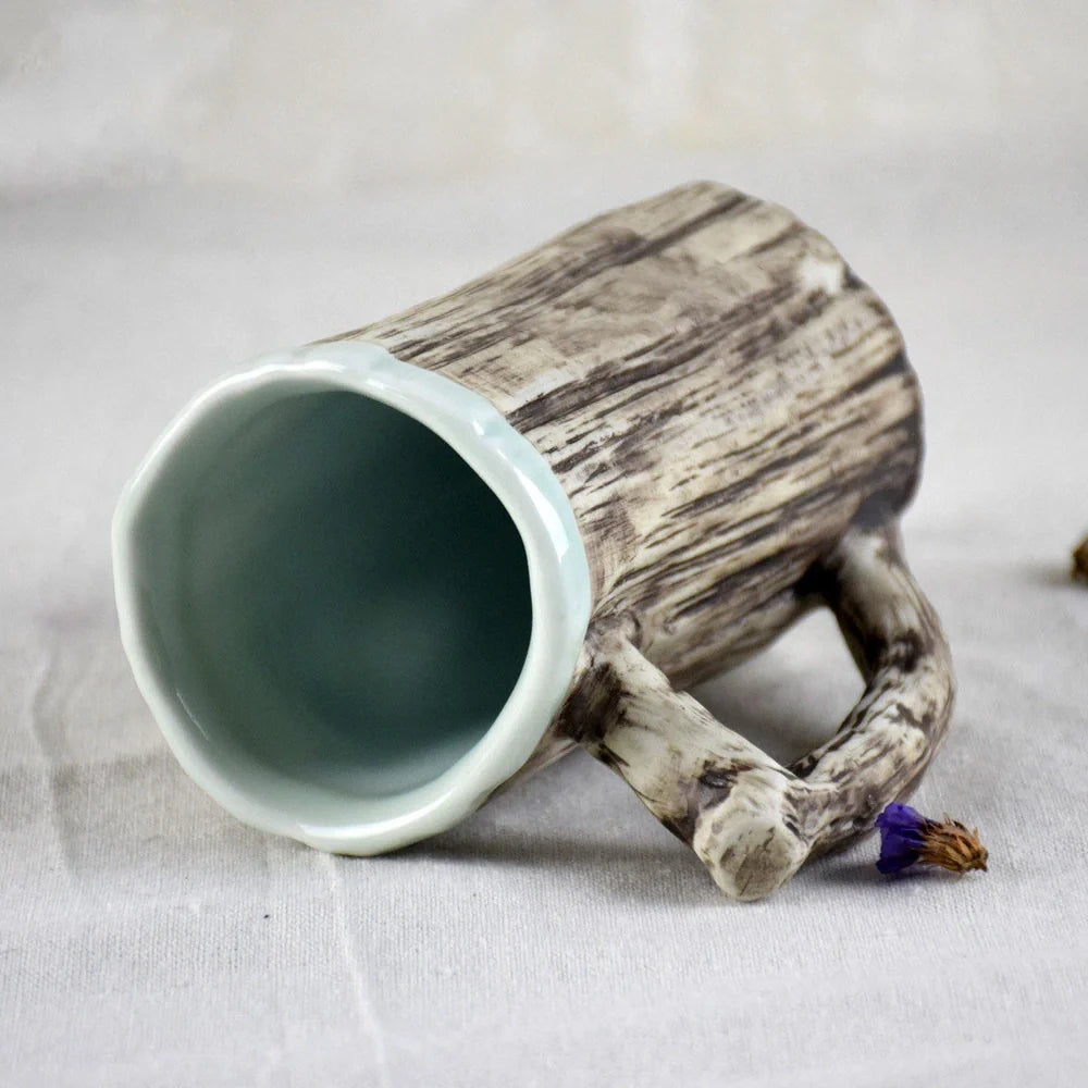 Irregular shaped bark-textured ceramic mug with 300ml capacity for hot drinks