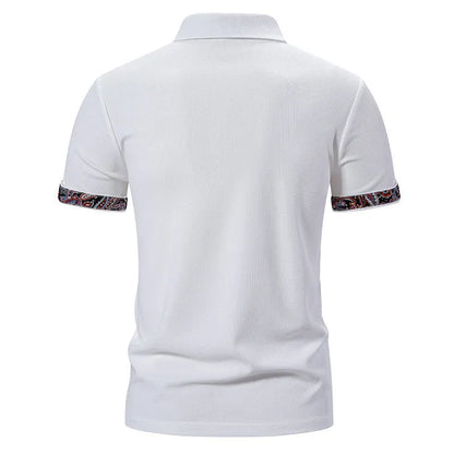 Men's polo shirt in cotton blend fabric with colour stitching at neck, available in white, black, or navy blue with European sizing