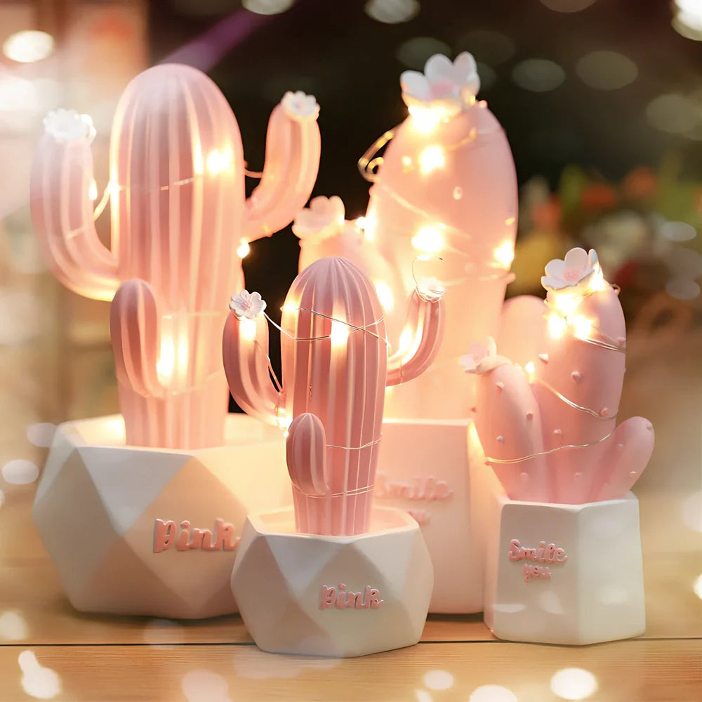 Cactus-shaped resin night light in gold finish measuring 15cm tall with warm LED glow