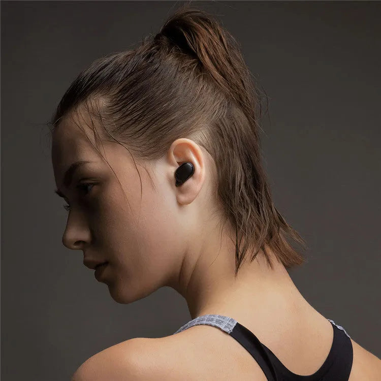 Black AirDots true wireless earbuds with charging case, showing 7.2mm drivers and three earplug sizes
