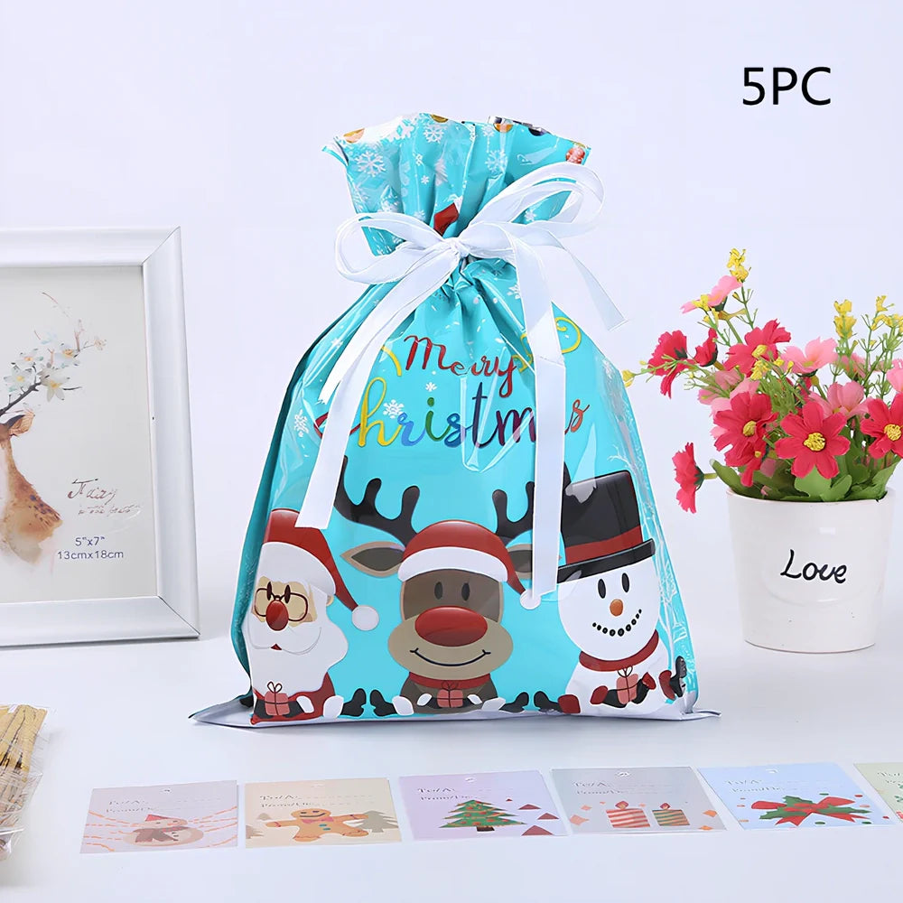 Christmas gift bag with drawstring closure in laser gold finish, 32x24cm dimensions