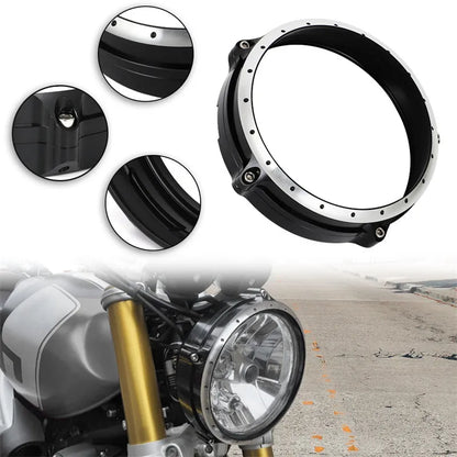 Black CNC aluminium headlight protective frame for BMW R NineT Scrambler motorcycle.