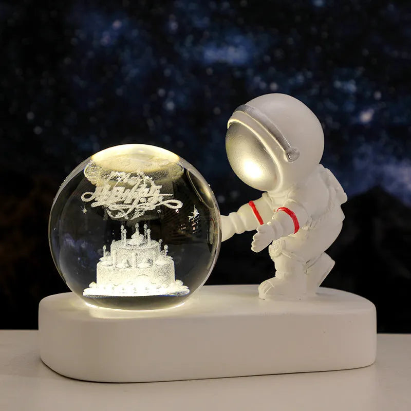 Astronaut crystal ball night light projecting galaxy pattern on 6cm resin sphere with USB cable