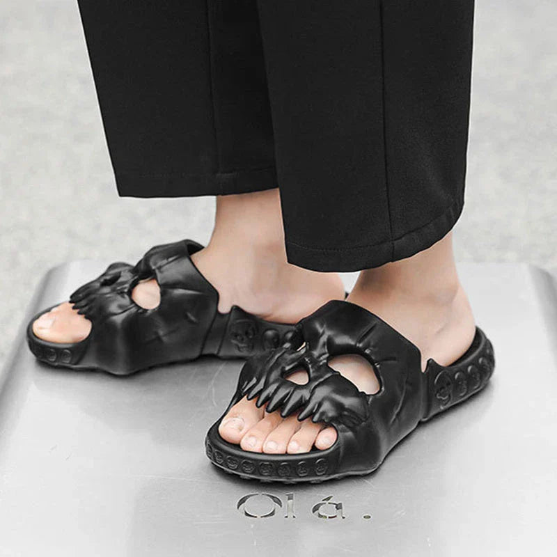 Spooky skull-printed slide sandals in various colors and sizes