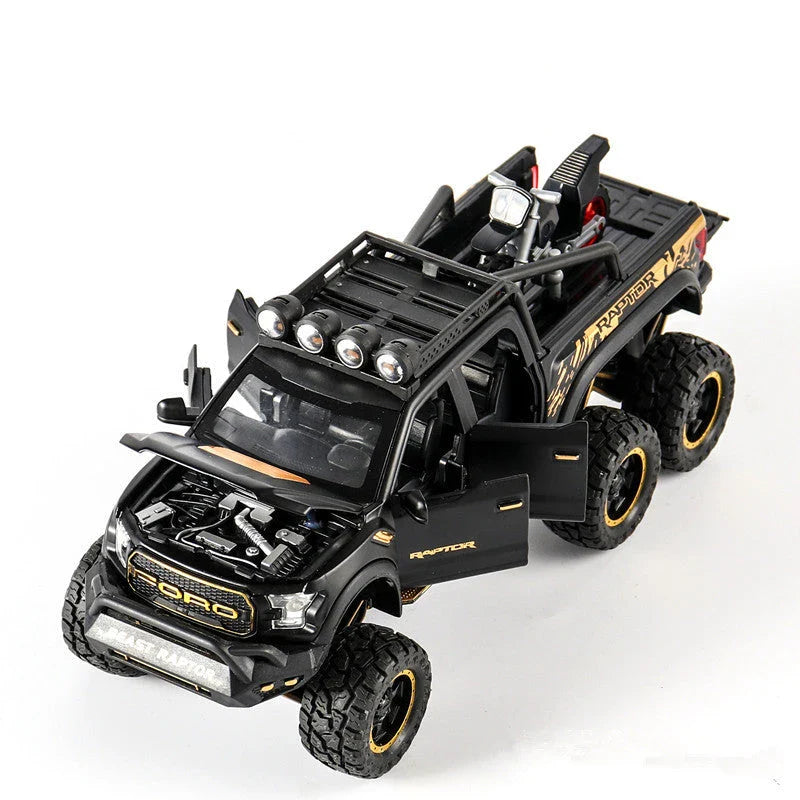 Realistic 1:28 scale Ford Raptor toy car with alloy body, lights, sounds, and pull-back action feature
