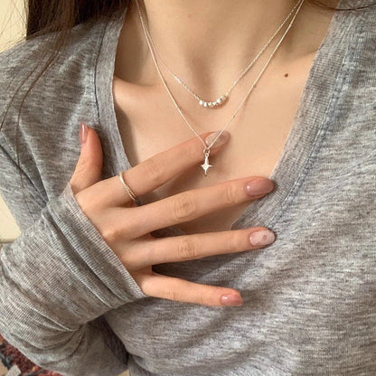 Elegant double-layer stainless steel cross necklace with opal accents