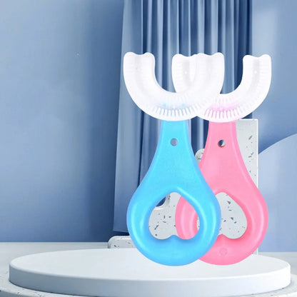 Children's U-shaped soft rubber toothbrush in pink and blue colours.