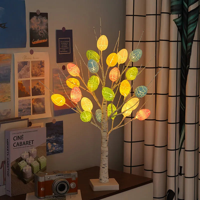 White birch-style LED Easter tree with warm white lights and cracked egg decorations on adjustable branches