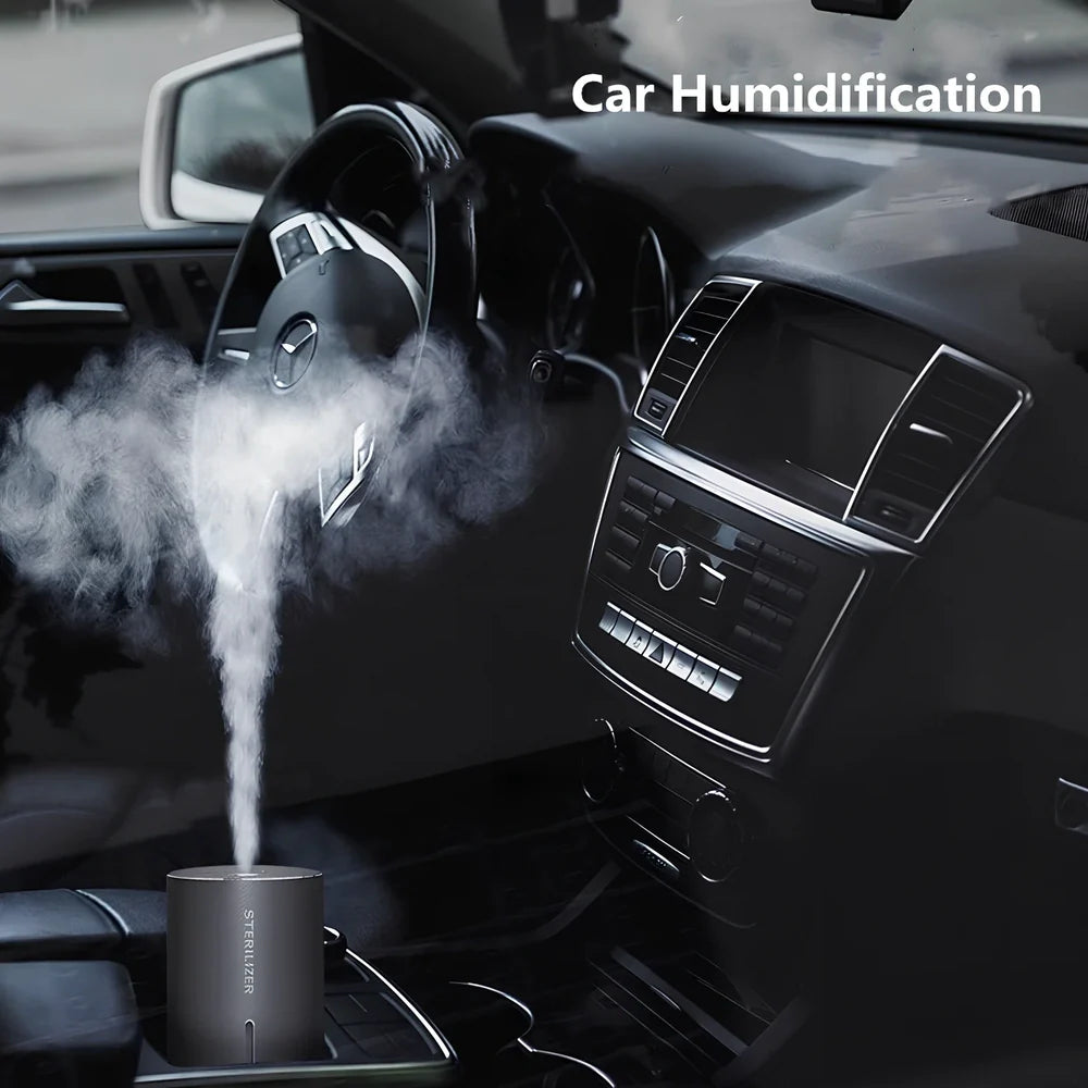 Compact aluminium humidifier with UV light, 65x65x115mm, black/green/purple colours, water tank visible