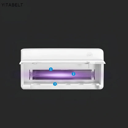 White UV toothbrush sterilisation holder with 253.7nm wavelength disinfection, 157mm width compact design for bathroom counter