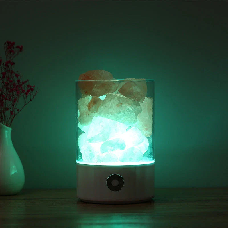 Himalayan salt lamp with warm, soothing glow and color-changing capabilities for air purification and relaxation