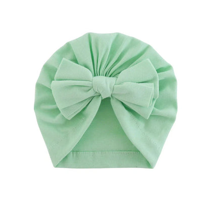 Soft hooded baby hat with bowknot in various colors for 0-1 year olds