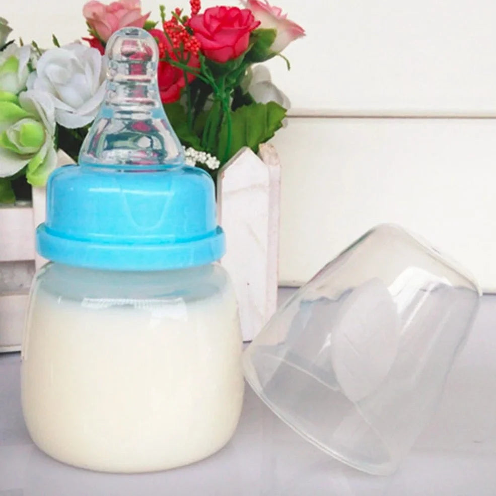 60ml infant feeding bottle with variable flow nipple in blue, green, or pink colour options