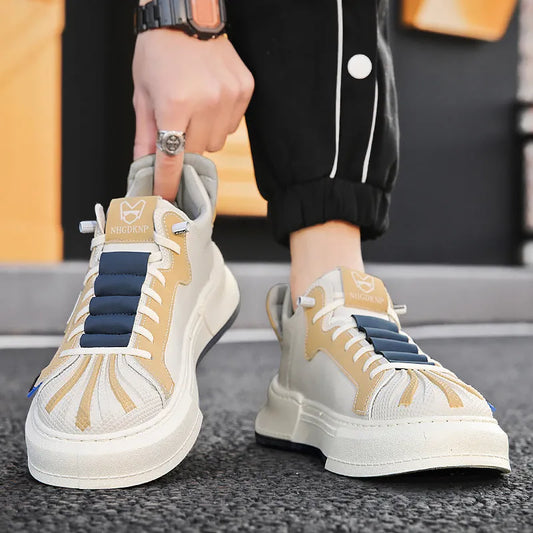 Men's beige low-top sneakers with elastic band closure and leather stitching on microfiber upper