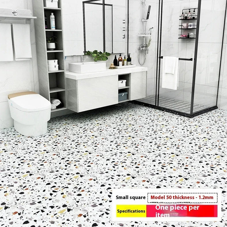 Self-adhesive vinyl flooring tile showing 30cm x 30cm dimensions with peel-and-stick backing visible