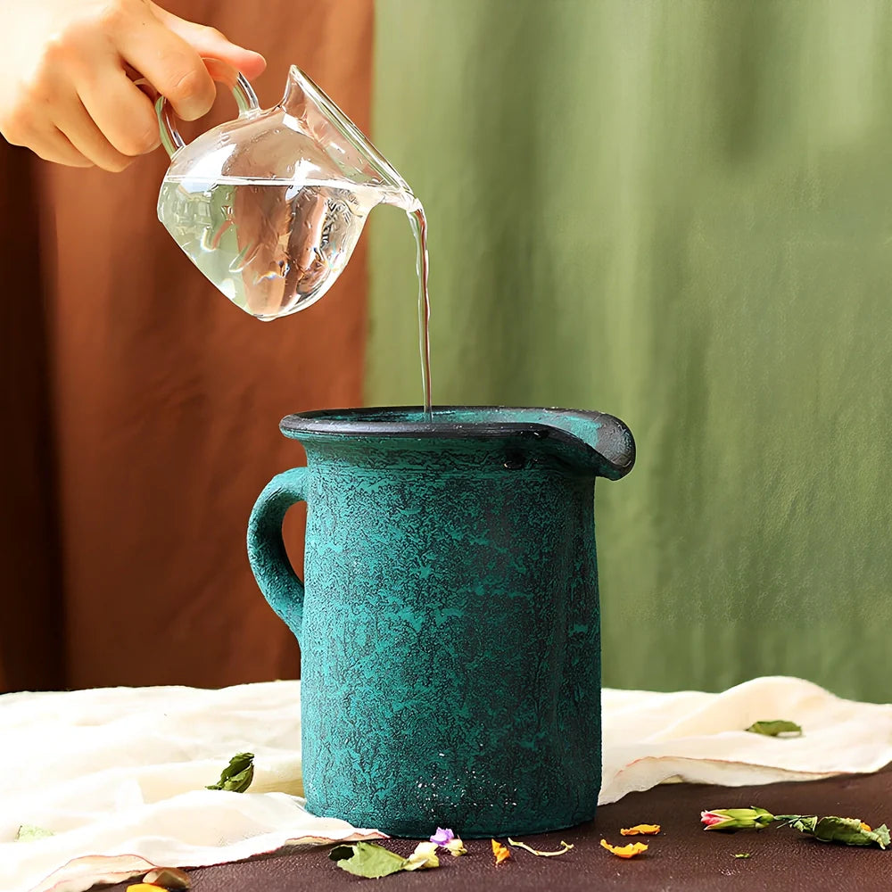 Ceramic mosaic vase with dried flowers, showing mosaic pattern and 25cm height