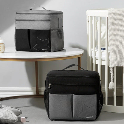 Versatile waterproof backpack with multiple compartments, padded back panel, and mesh side pocket for modern parents