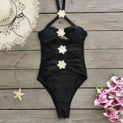 Solid colour women's one-piece swimsuit with hollow-out tube top and detachable short skirt on a mannequin.