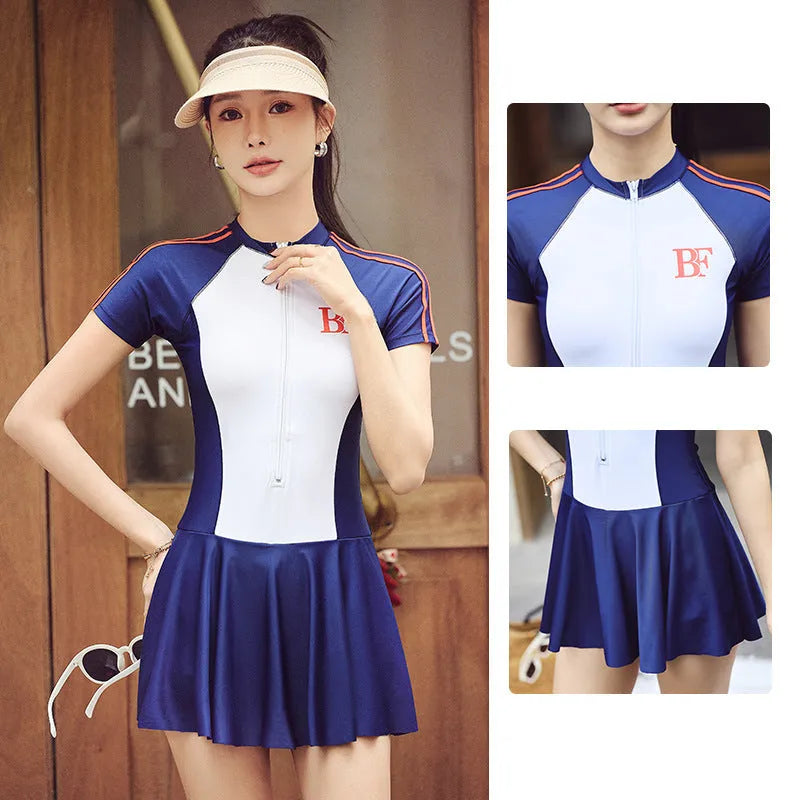 Women's conservative one-piece sports swimsuit in a tight fit, shown in colour E92 or E93.