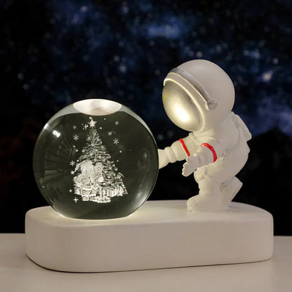 Astronaut crystal ball night light projecting galaxy pattern on 6cm resin sphere with USB cable