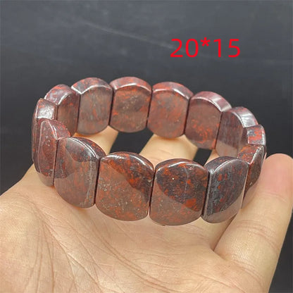 Bloodstone meteorite bracelet in quartz rock jade with traditional pendant options on wrist