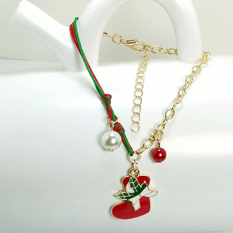 Charming Christmas bracelet with festive charms like Santa, snowmen, and snowflakes