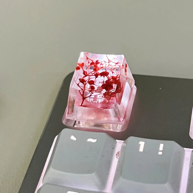 Resin keycap high transparency starry sky design, 1.8*1.2 unit size for mechanical keyboards, artisan resin keycap replacement for cherry MX switches, available in red, pink, green, violet colour options.