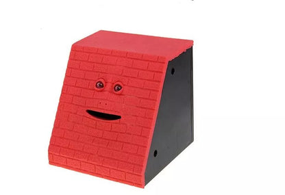 Face Intelligent Induction Electric Piggy Bank with realistic money-eating action in brick blue, pink, or red
