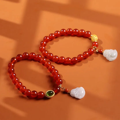 Handcrafted red agate bracelet with amber beads, jade accents, and Maitreya Buddha pendant in Chinese geometric style