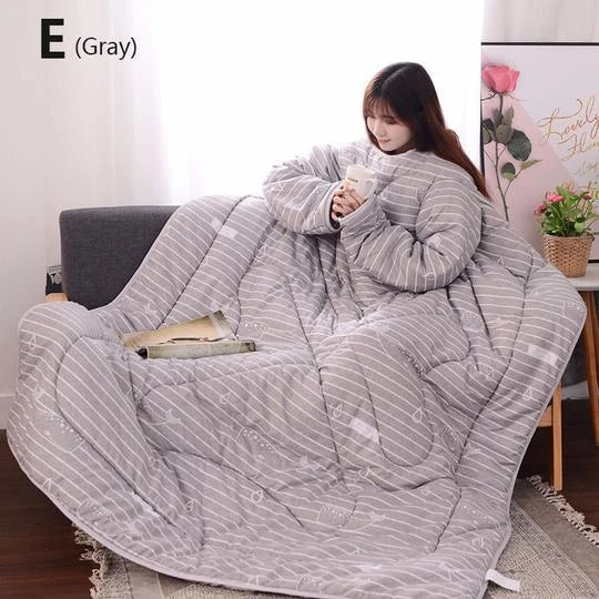 Cozy fleece blanket with sleeves in various colors, perfect for relaxing and enjoying indoor activities