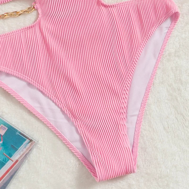 Ladies solid color one piece swimsuit with chest pad in pink and black