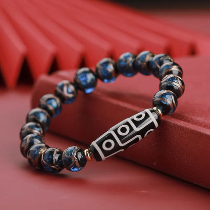 Colourful Chinese-style coloured glaze bracelet with auspicious patterns and snake symbol on beads.