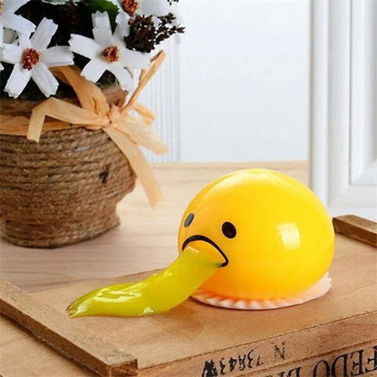 Gudetama Vomiting Egg Toy in green, orange, pink, and yellow for stress relief and fun