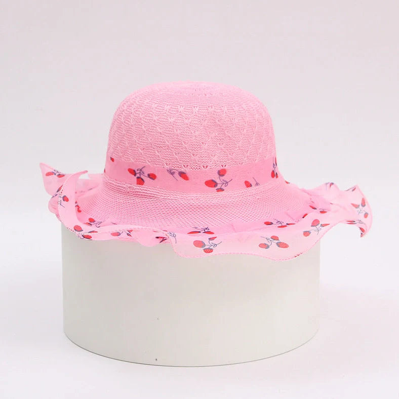 Children's princess straw hat with floral accents and wide brim for sun protection