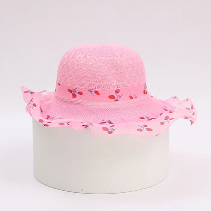 Children's princess straw hat with floral accents and wide brim for sun protection